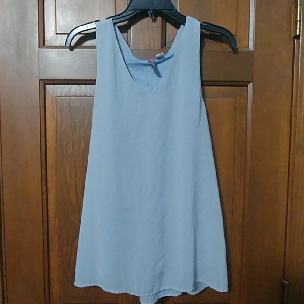 Light blue flowy tank top.